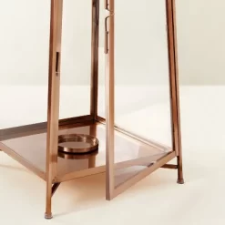 Raised Metal & Glass Pillar Candle Lantern Copper - Hearth & Hand™ With Magnolia 10 Raised Metal & Glass Pillar Candle Lantern Copper - Hearth & Hand™ With Magnolia -Home Decor Store GUEST 387cd88b 3e75 4c64 8f3b dd1153cd38c8